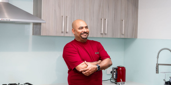 Plico Member Leigh in his kitchen