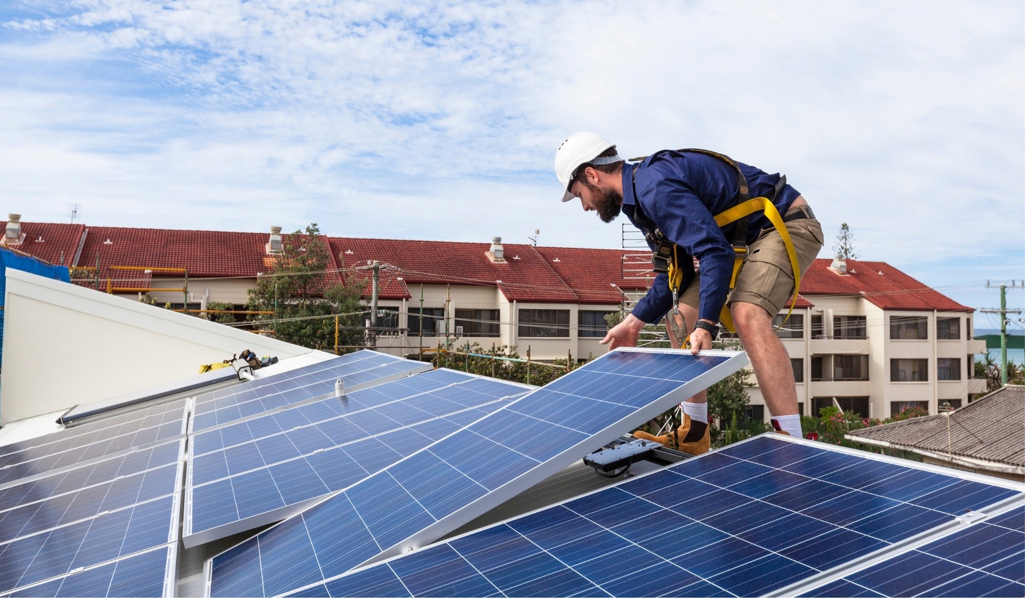 Man installing solar on roof 