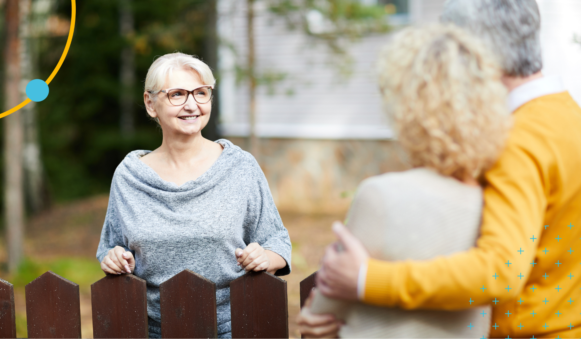 woman in grey sweater talking to her neighbours