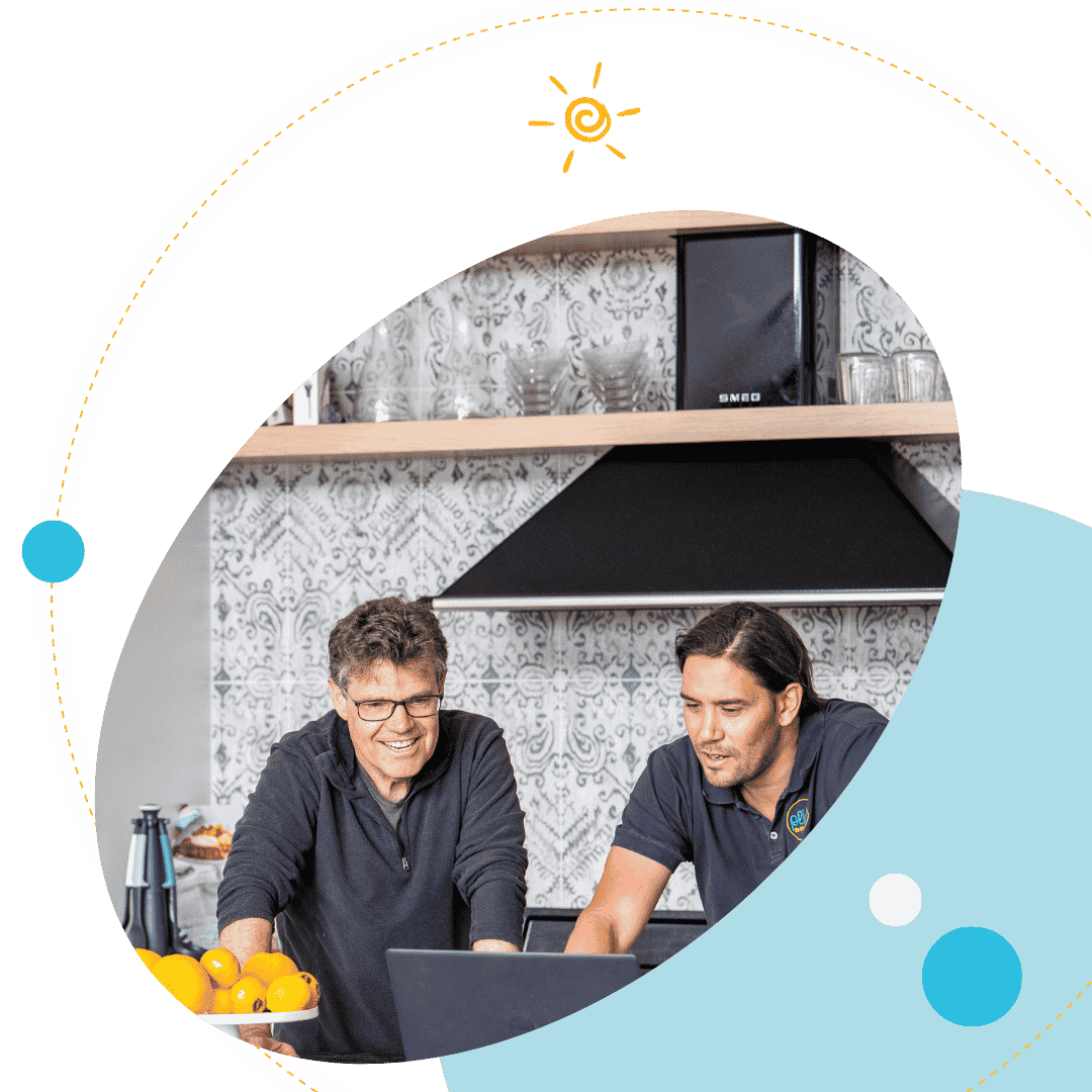 Plico member in kitchen on computer