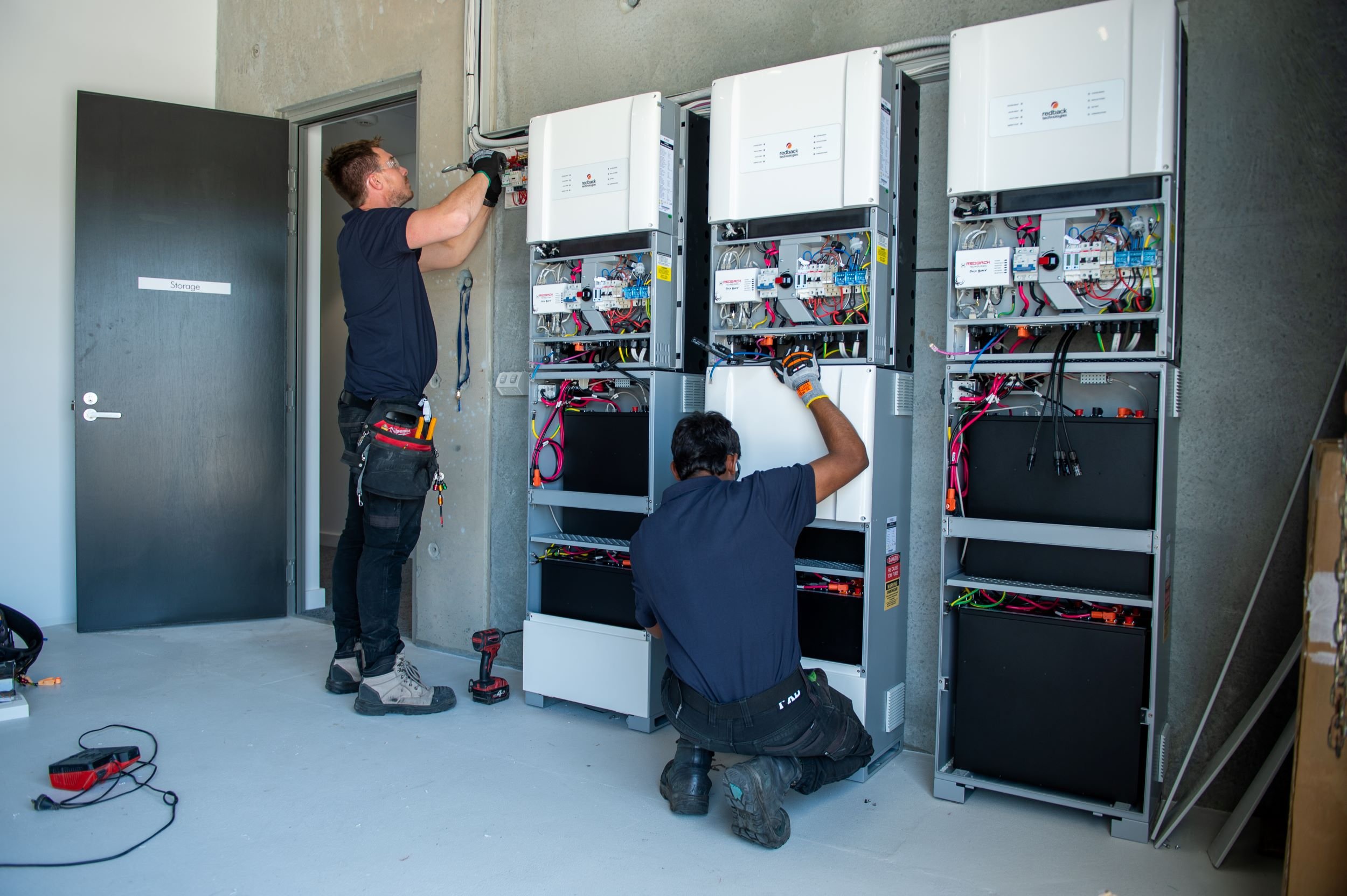Three Plico solar batteries being installed in Surfing WA's HQ
