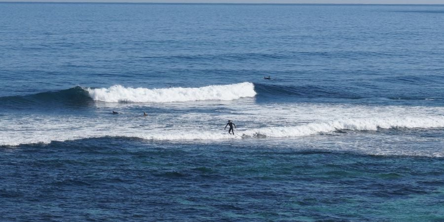 Junior surfer riding wave at Yallingup