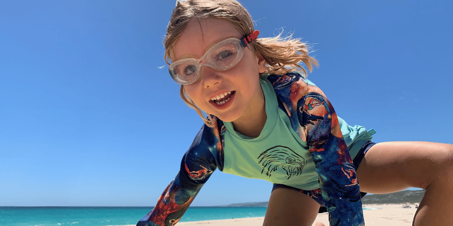 Young boy enjoying the beach in Hamelin Bay, WA.