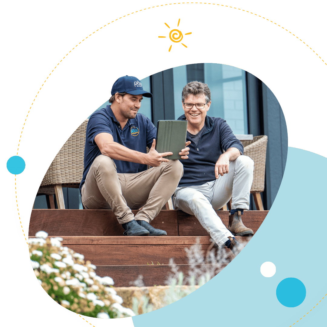Plico team member on verandah with Plico member