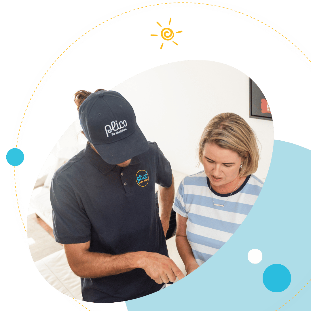 Plico installer speaking to customer in home